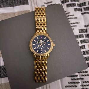 Michele half moon & stars gold watch with blue face